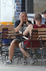 AMELIA LILY Out for Drmiks with Friends at Distillery on Portobello Road in Notting Hill 08/08/2022