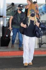 ANNA FARIS Arrives at LAX Airport in Los Angeles 08/28/2022