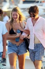 APPLE MARTIN Out with a Male Friend in Ibiza 07/23/2022