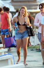 APPLE MARTIN Out with a Male Friend in Ibiza 07/23/2022