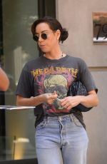 AUBREY PLAZA in Denim Leaves Her Hotel in New York 08/11/2022