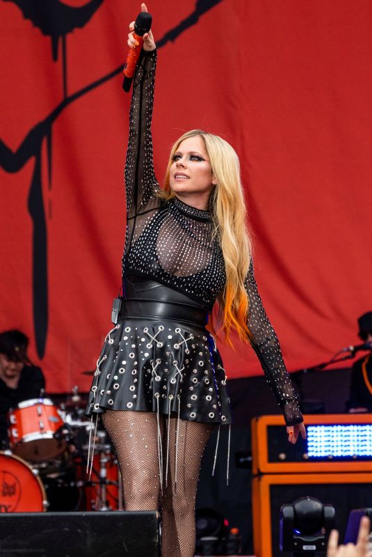 AVRIL LAVIGNE Performs at Machine Gun Kelly Concert at Firstenergy Stadium in Cleveland 08/13/2022