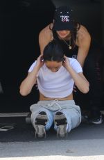 CARA SANTANA Stretches Out Before Hetting Her Workout Done in Los Angeles 08/12/2022