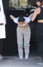 CARA SANTANA Stretches Out Before Hetting Her Workout Done in Los Angeles 08/12/2022