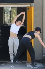 CARA SANTANA Stretches Out Before Hetting Her Workout Done in Los Angeles 08/12/2022