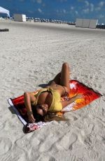 CLAUDIA ROMANI in Bikini at a Beach in Miami 08/11/2022