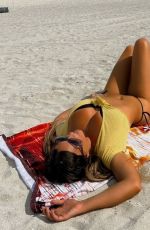 CLAUDIA ROMANI in Bikini at a Beach in Miami 08/11/2022