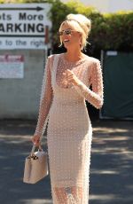 EMMA HERNAN Leaves The Oppenheim Group Office in Los Angeles 08/17/2022