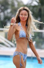 GIA SKOVA in Bikini at a Pool in California 08/23/2022