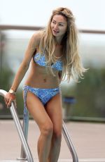 GIA SKOVA in Bikini at a Pool in California 08/23/2022