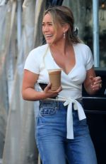 HILARY DUFF in Ripped Denim Out for Lunch to-go in Beverly Hills 08/116/2022