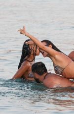 IRINA SHAYK and STELLA MAXWELL in Bikinis in Ibiza 08/06/2022