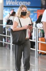 JENNIFER LAWRENCE and Cooke Maroney at JFK Airport in New York 08/07/2022