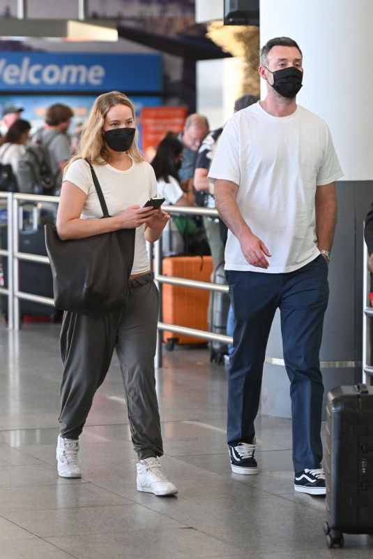 JENNIFER LAWRENCE and Cooke Maroney at JFK Airport in New York 08/07/2022
