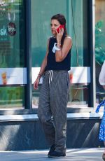 KATIE HOLMES Out Chatting on Her Phone in New York 08/30/2022