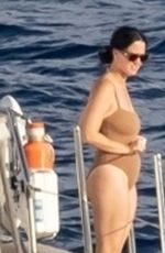 KATY PERRY in a Brown Strapless Swimsuit at a Yacht in Nerano 08/24/2022