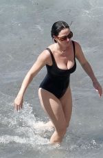 KATY PERRY in Swimsuit at a Beach in Positano 08/21/2022