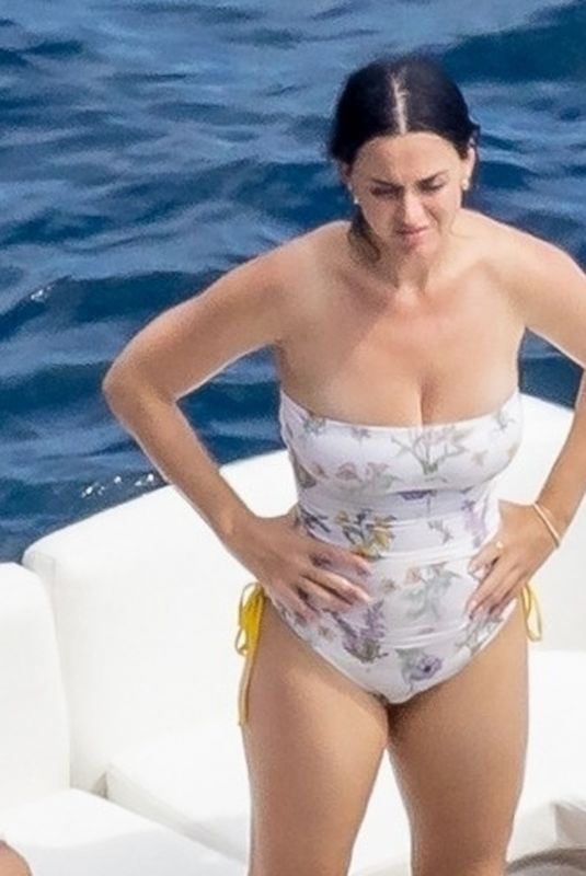 KATY PERRY in Swimsuit at a Beach in Positano 08/26/2022