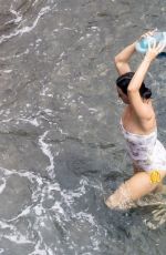 KATY PERRY in Swimsuit at a Beach in Positano 08/26/2022