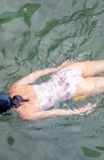 KATY PERRY in Swimsuit at a Beach in Positano 08/26/2022