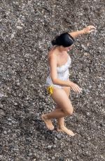 KATY PERRY in Swimsuit at a Beach in Positano 08/26/2022