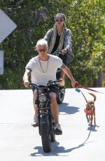 KELLY GALE and Joel Kinnaman Rides Their Super73 Bikes in Venice Beach 08/28/2022