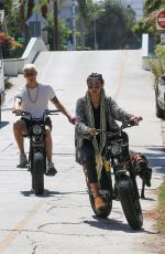 KELLY GALE and Joel Kinnaman Rides Their Super73 Bikes in Venice Beach 08/28/2022