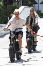 KELLY GALE and Joel Kinnaman Rides Their Super73 Bikes in Venice Beach 08/28/2022