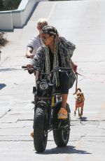 KELLY GALE and Joel Kinnaman Rides Their Super73 Bikes in Venice Beach 08/28/2022