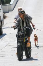 KELLY GALE and Joel Kinnaman Rides Their Super73 Bikes in Venice Beach 08/28/2022