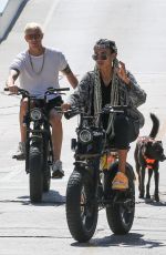 KELLY GALE and Joel Kinnaman Rides Their Super73 Bikes in Venice Beach 08/28/2022