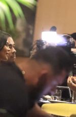 KYLIE JENNER and Makeup Artist Ariel and Hairstylist Jesus at Mandarin Restaurant in Milan 08/02/2022