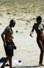 LAURA HARRIER and Sam Jarou at a Beach in Pantelleria 07/29/2022