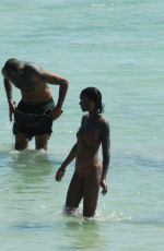 LAURA HARRIER and Sam Jarou at a Beach in Pantelleria 07/29/2022
