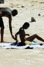 LAURA HARRIER and Sam Jarou at a Beach in Pantelleria 07/29/2022