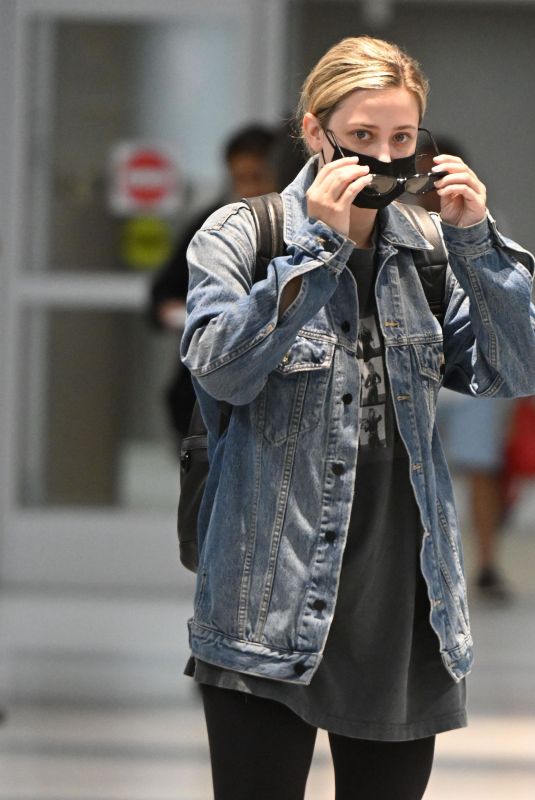 LILI REINHART Arrives at JFK Airport in New York 08/08/2022