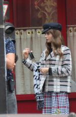 LILY COLLINS on the Set of Emily in Paris 08/24/2022