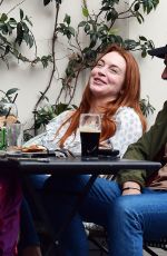 LINDSAY LOHAN and Bader Shammas Out for Drinks in London 08/28/2022