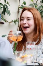 LINDSAY LOHAN and Bader Shammas Out for Drinks in London 08/28/2022