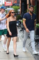 LINDSAY LOHAN Arrives at Her Hotel in New York 08/02/2022