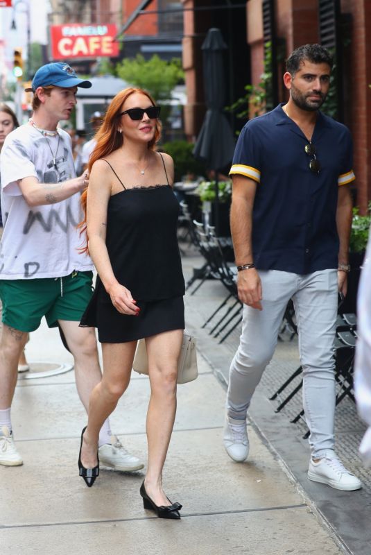 LINDSAY LOHAN Arrives at Her Hotel in New York 08/02/2022