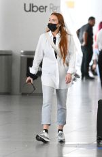 LINDSAY LOHAN Arrives at JFK Airport in New York 07/29/2022