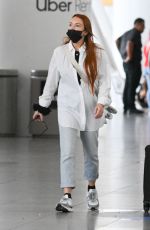 LINDSAY LOHAN Arrives at JFK Airport in New York 07/29/2022