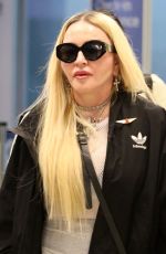 MADONNA Arrives with Her Son David Banda at JFK Airport in New York 08/11/2022