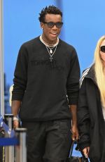 MADONNA Arrives with Her Son David Banda at JFK Airport in New York 08/11/2022