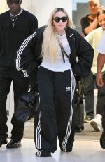 MADONNA Arrives with Her Son David Banda at JFK Airport in New York 08/11/2022