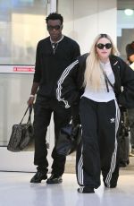 MADONNA Arrives with Her Son David Banda at JFK Airport in New York 08/11/2022