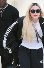 MADONNA Arrives with Her Son David Banda at JFK Airport in New York 08/11/2022