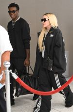 MADONNA Arrives with Her Son David Banda at JFK Airport in New York 08/11/2022