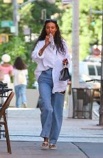 MAYA JAMA Out in Denim and Oversized White Shirt in New York 08/23/2022